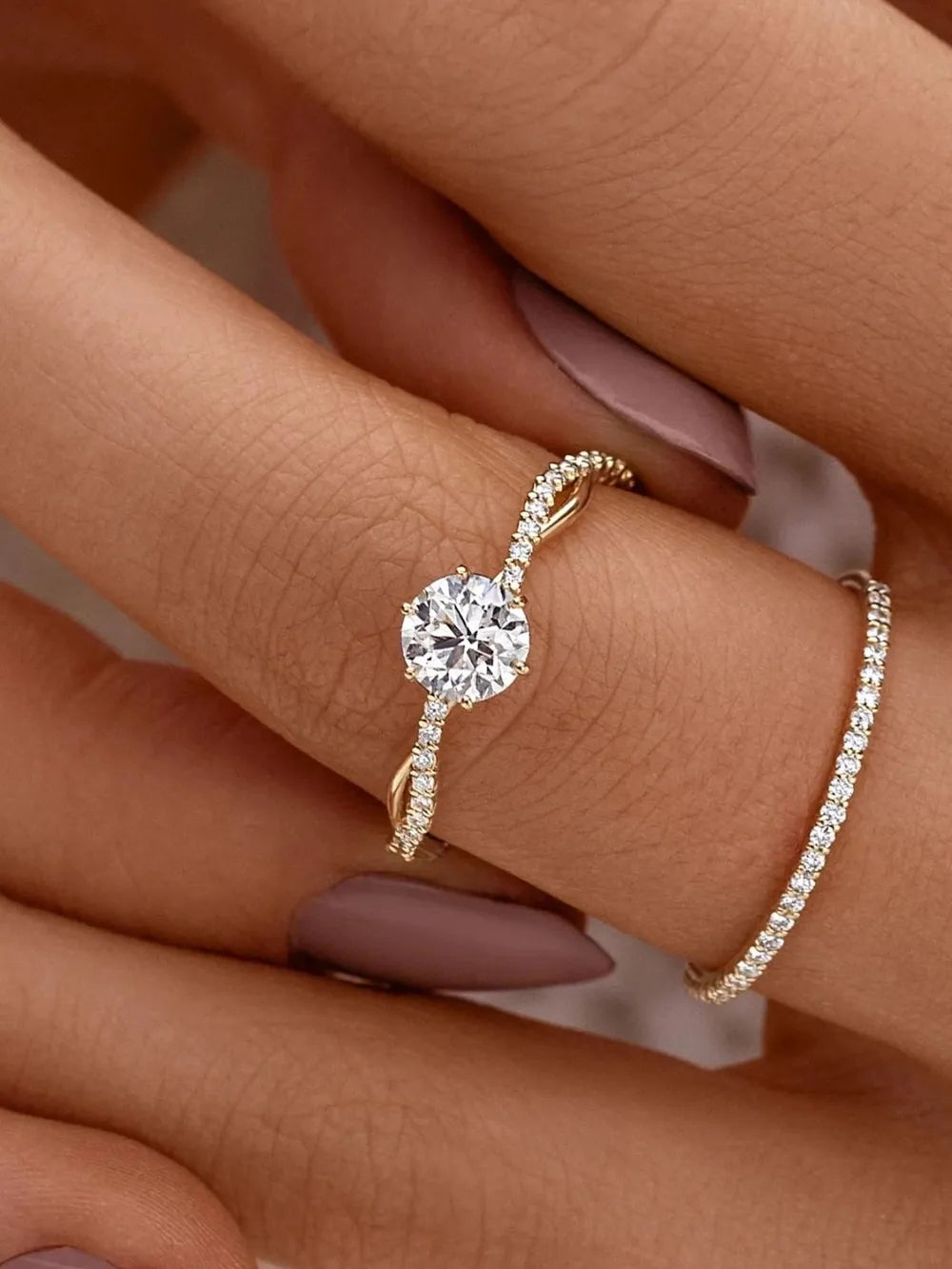 Glittering Twist-Design Diamond Ring on Fingertip