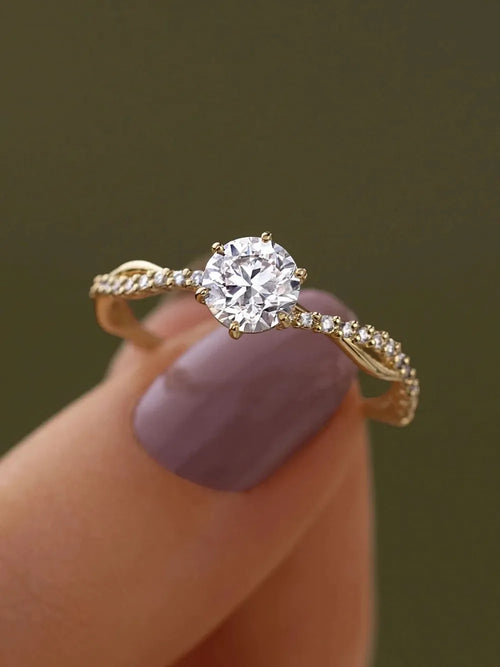 Glittering Twist-Design Diamond Ring on Fingertip