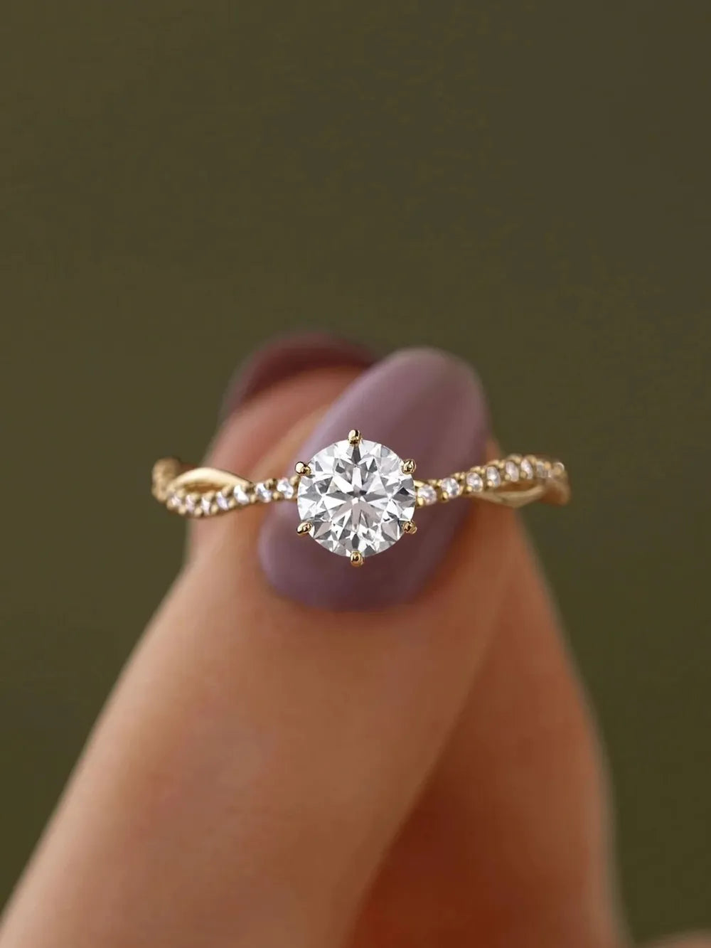 Glittering Twist-Design Diamond Ring on Fingertip